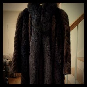 Mink coat with fox trim.